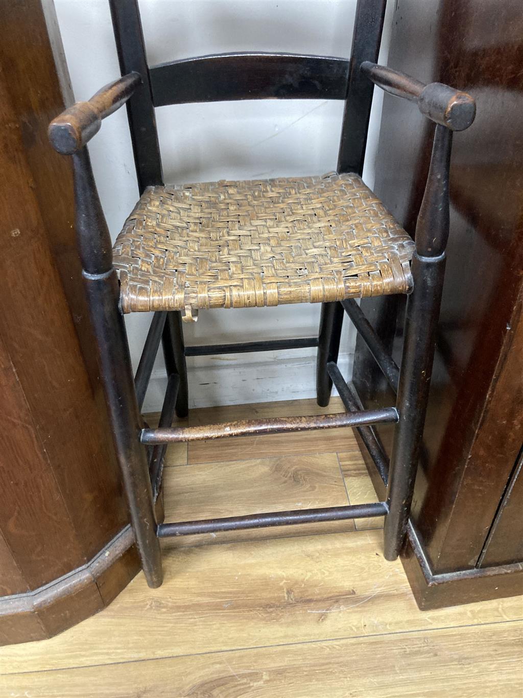 A Victorian mahogany pedestal cupboard, width 46cm depth 40cm height 87cm, together with a childs correction chair